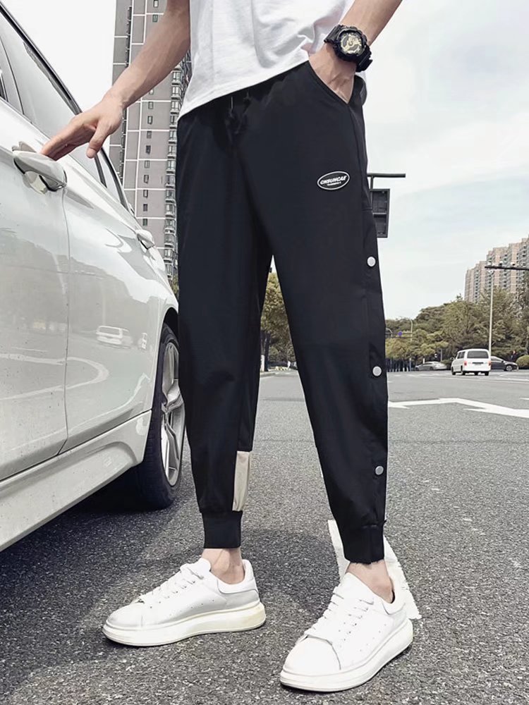 กางเกงสตรีทผู้ชายสุดเท่ สไตล์ลำลองเก้าส่วน ใส่สบายคล่องตัว เหมาะกับฤดูใบไม้ผลิและฤดูร้อน